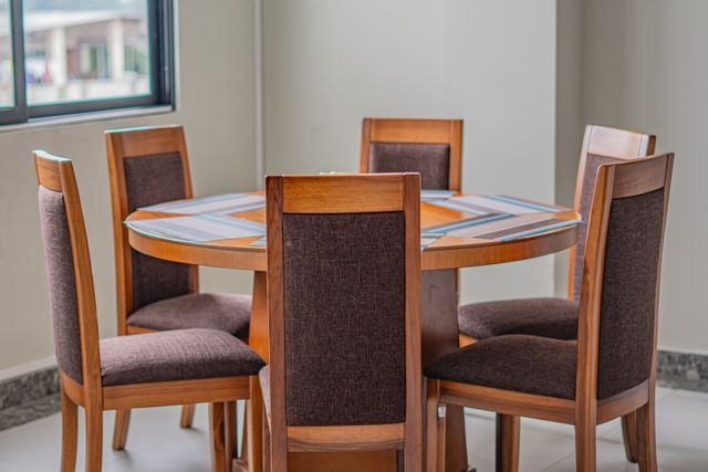 table surrounded by chairs