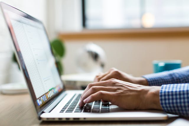 a landlord typing up a rent increase letter