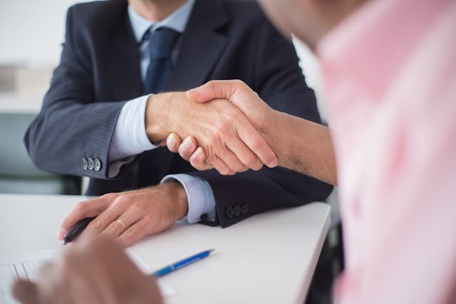 Two people shaking hands