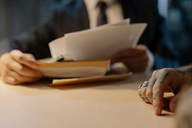 person looking at documents