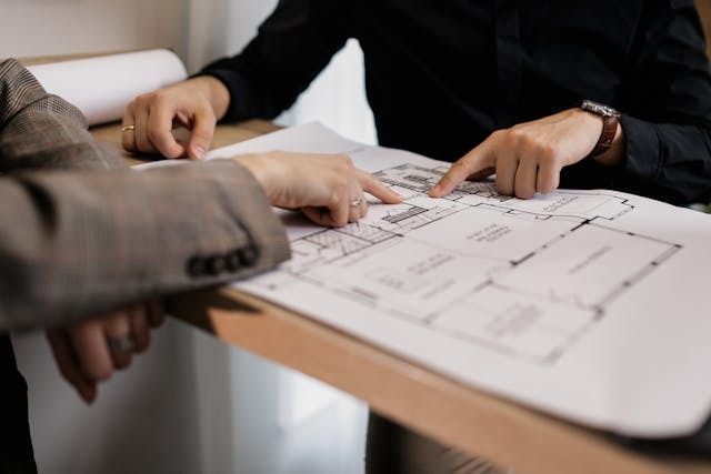 people looking at house plans (2)